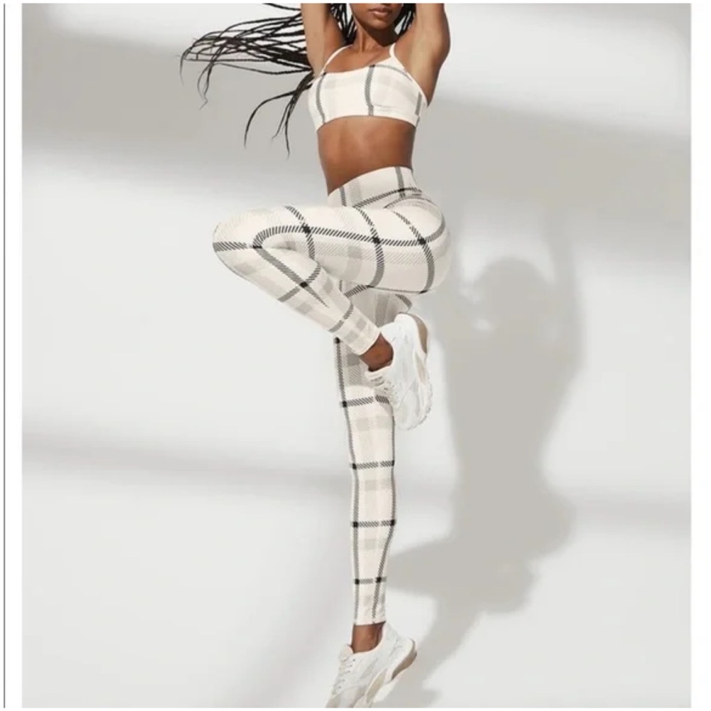 ALO Yoga Cream and Black Plaid Leggings and sports bra